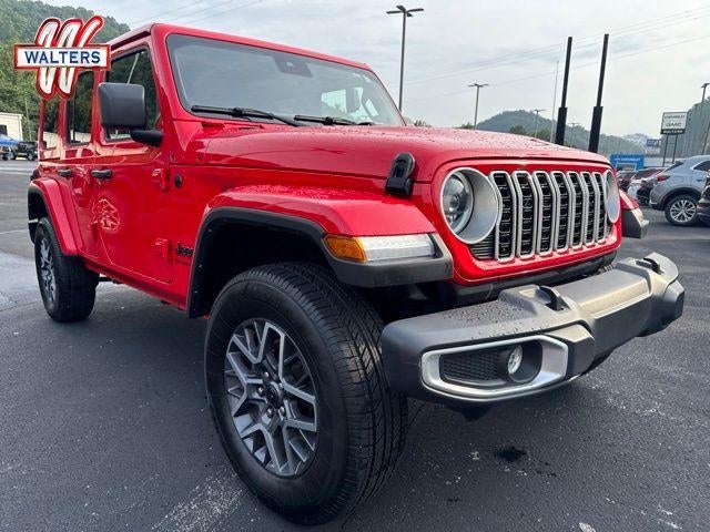 2025 Jeep Wrangler Sahara 4 Door 4x4 in Red — front three-quarter view