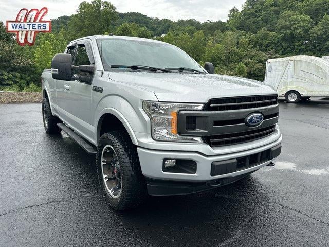 2018 Ford F-150 XLT 4WD SuperCab 6.5' Box in Ingot Silver Metallic — front three-quarter view