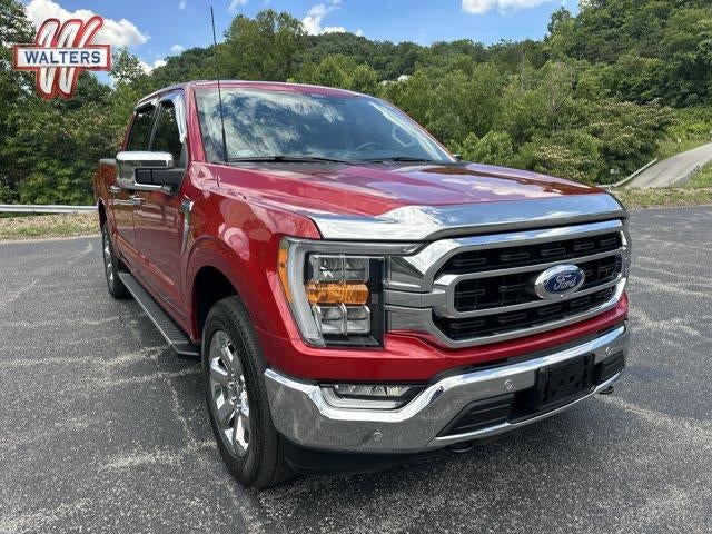 2022 Ford F-150 XLT 4WD SuperCrew 5.5' Box in Rapid Red Metallic Tinted Clearcoat — front three-quarter view