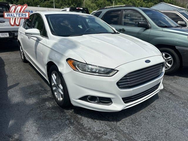2013 Ford Fusion 4dr Sdn SE FWD in Oxford White — front three-quarter view