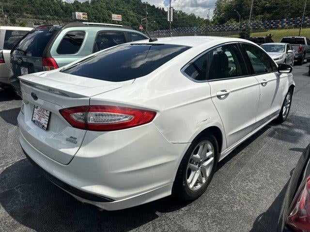 2013 Ford Fusion — side profile view