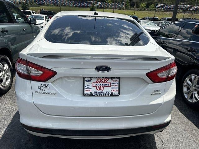 2013 Ford Fusion — rear three-quarter view