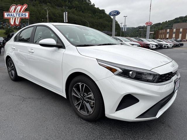 2024 Kia Forte LXS IVT in Snow White Pearl — front three-quarter view