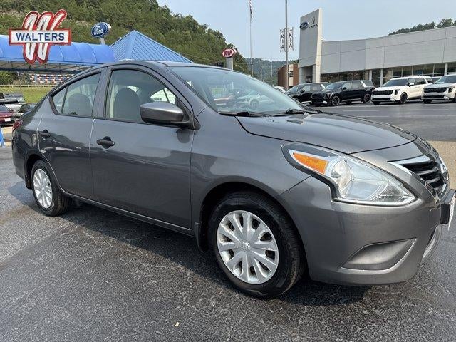 2017 Nissan Versa Sedan S Plus CVT in Gun Metallic — front three-quarter view