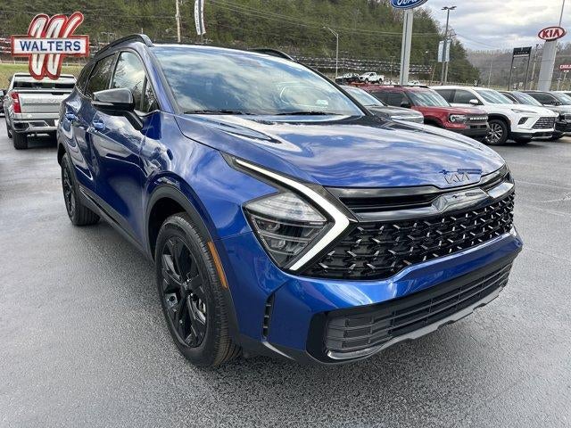 2025 Kia Sportage X-Line AWD in Sapphire Blue — front three-quarter view