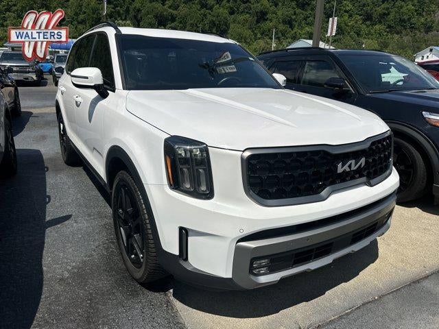 2023 Kia Telluride SX Prestige X-Line AWD in Glacial White Pearl — front three-quarter view