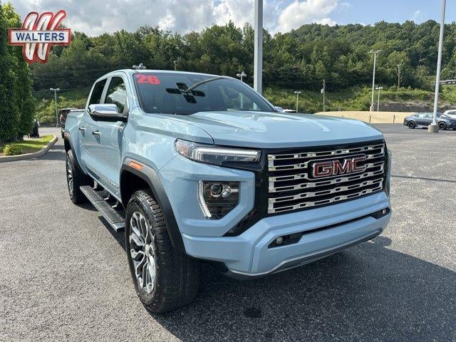 2026 GMC Canyon Crew Cab Short Box 4-Wheel Drive Denali in Glacier Metallic — front three-quarter view