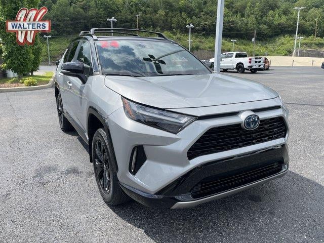 2024 Toyota RAV4 Hybrid XSE AWD (Natl) in Silver Sky Metallic/Midnight Black Metallic — front three-quarter view