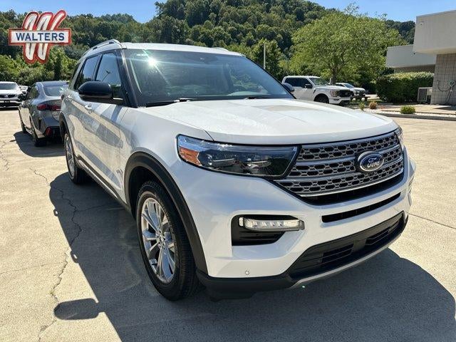 2023 Ford Explorer Limited 4WD in Star White Metallic Tri-Coat — front three-quarter view