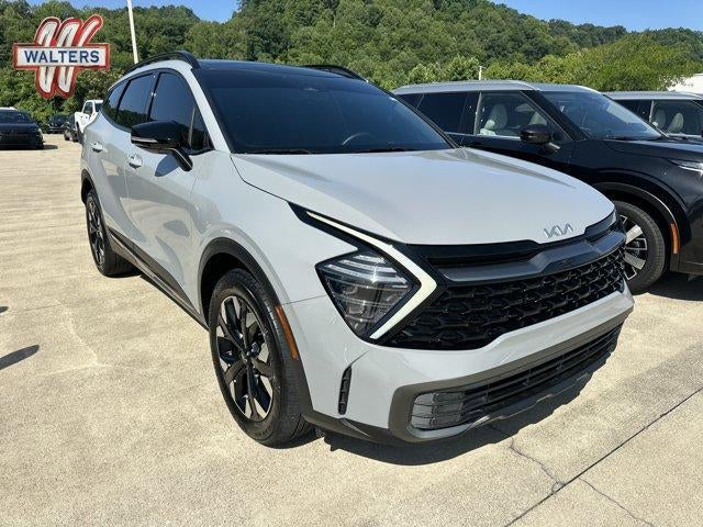 2024 Kia Sportage X-Line AWD in Wolf Gray — front three-quarter view